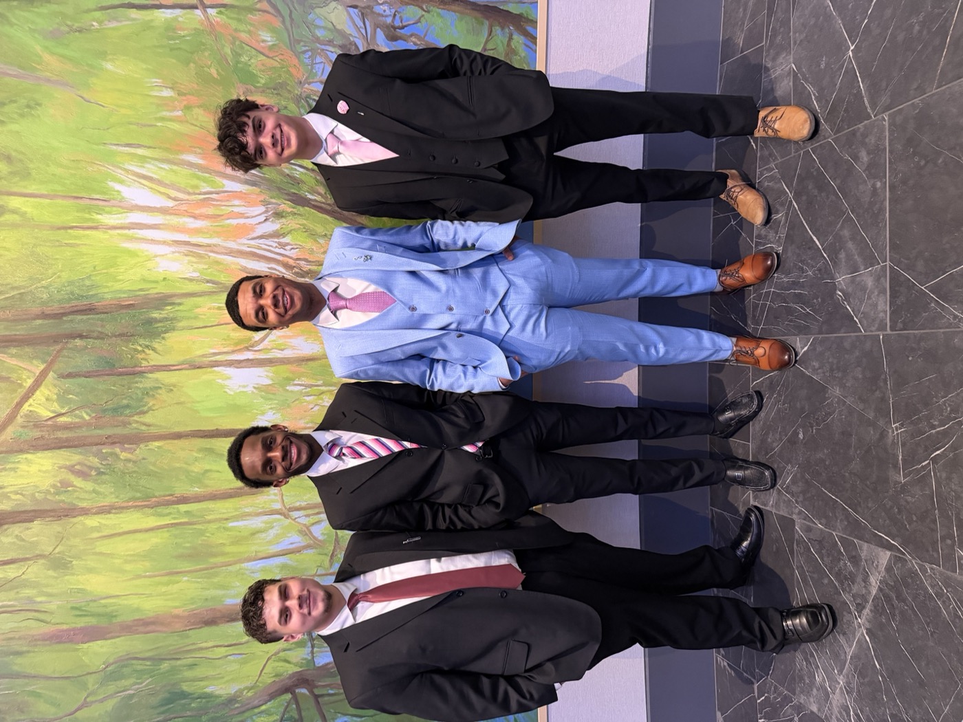 Limitless Acquisitions team members in professional attire